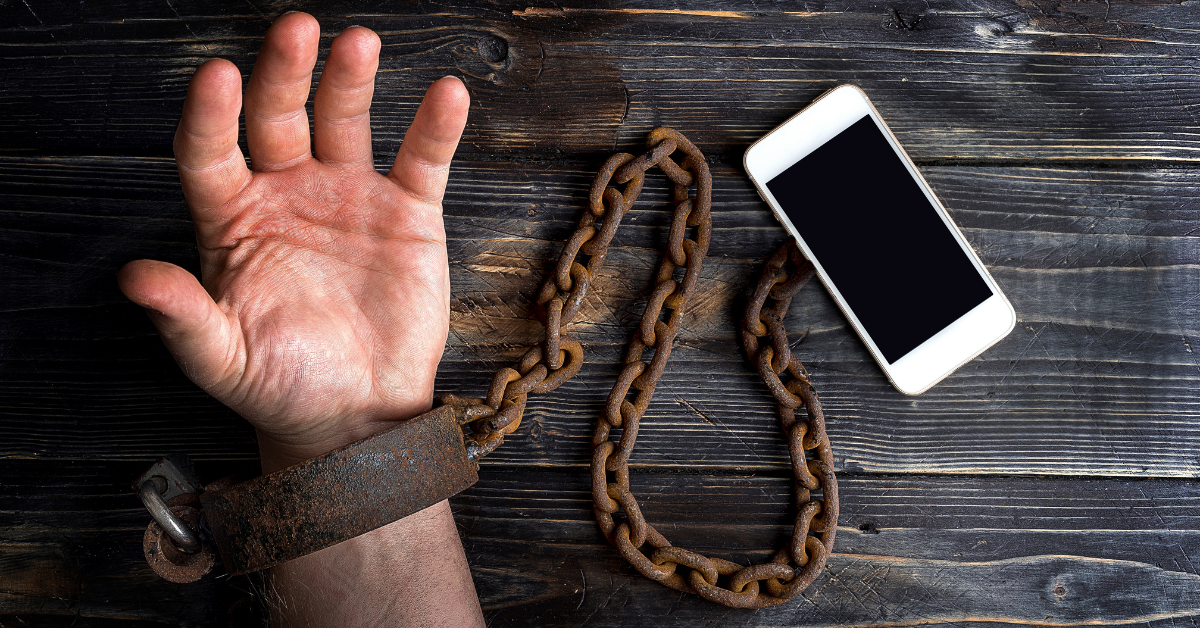 zarobljena ruka mobilnim telefonom